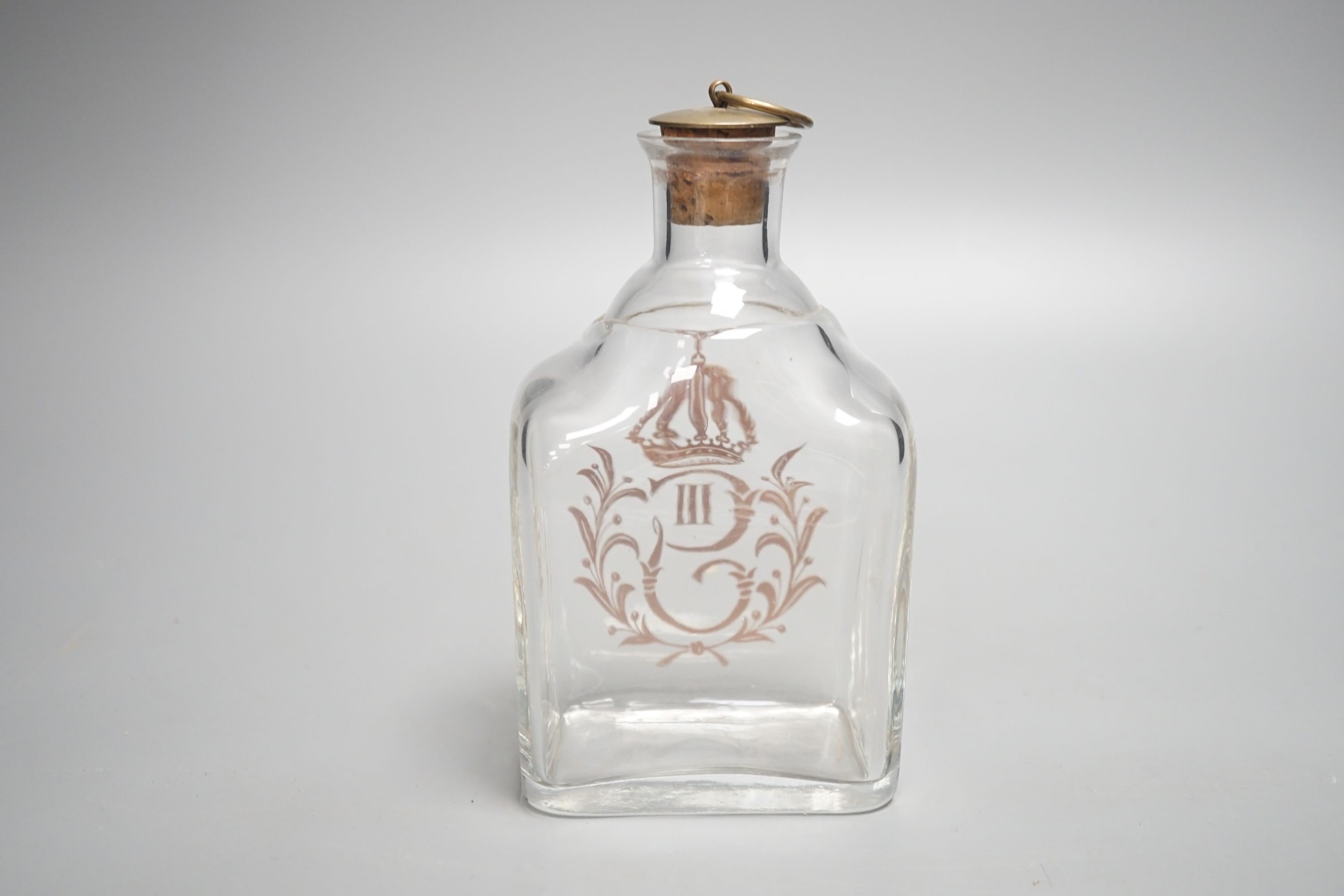 A 19th century crested glass decanter 17cm
